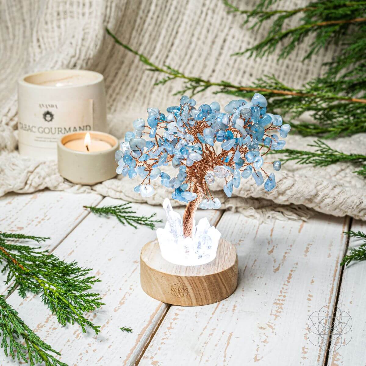 Aquamarine crystal tree lamp with a guardian angel on a wooden base