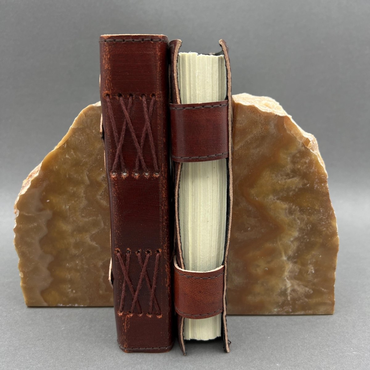 Pair of polished honey calcite bookends for cozy coastal winter decor
