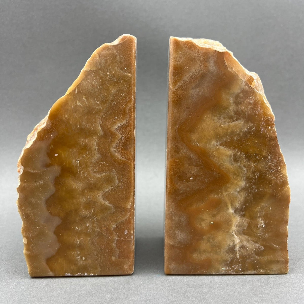 Pair of honey calcite bookends with polished faces, view 2