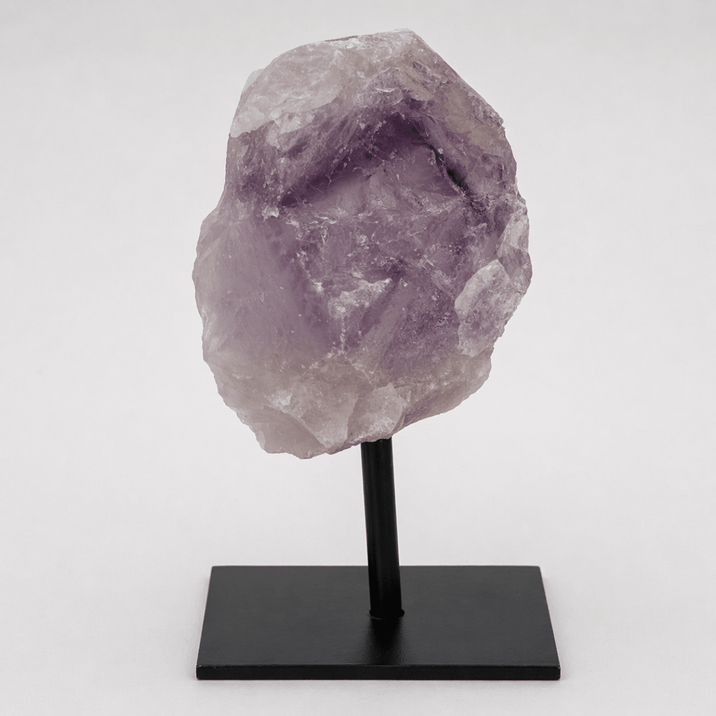 Rough amethyst specimen on a metal stand, view 2
