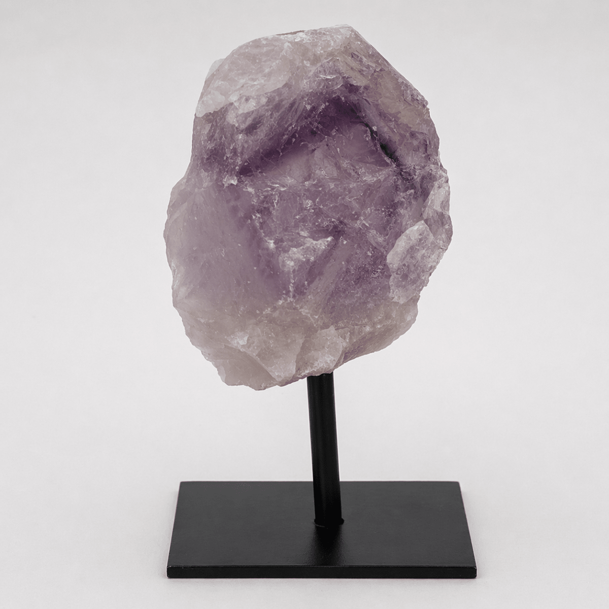 Rough amethyst specimen on a metal stand, view 2