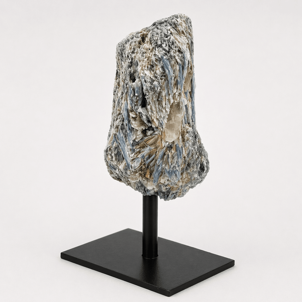 Rough blue kyanite specimen on a metal stand, view 3